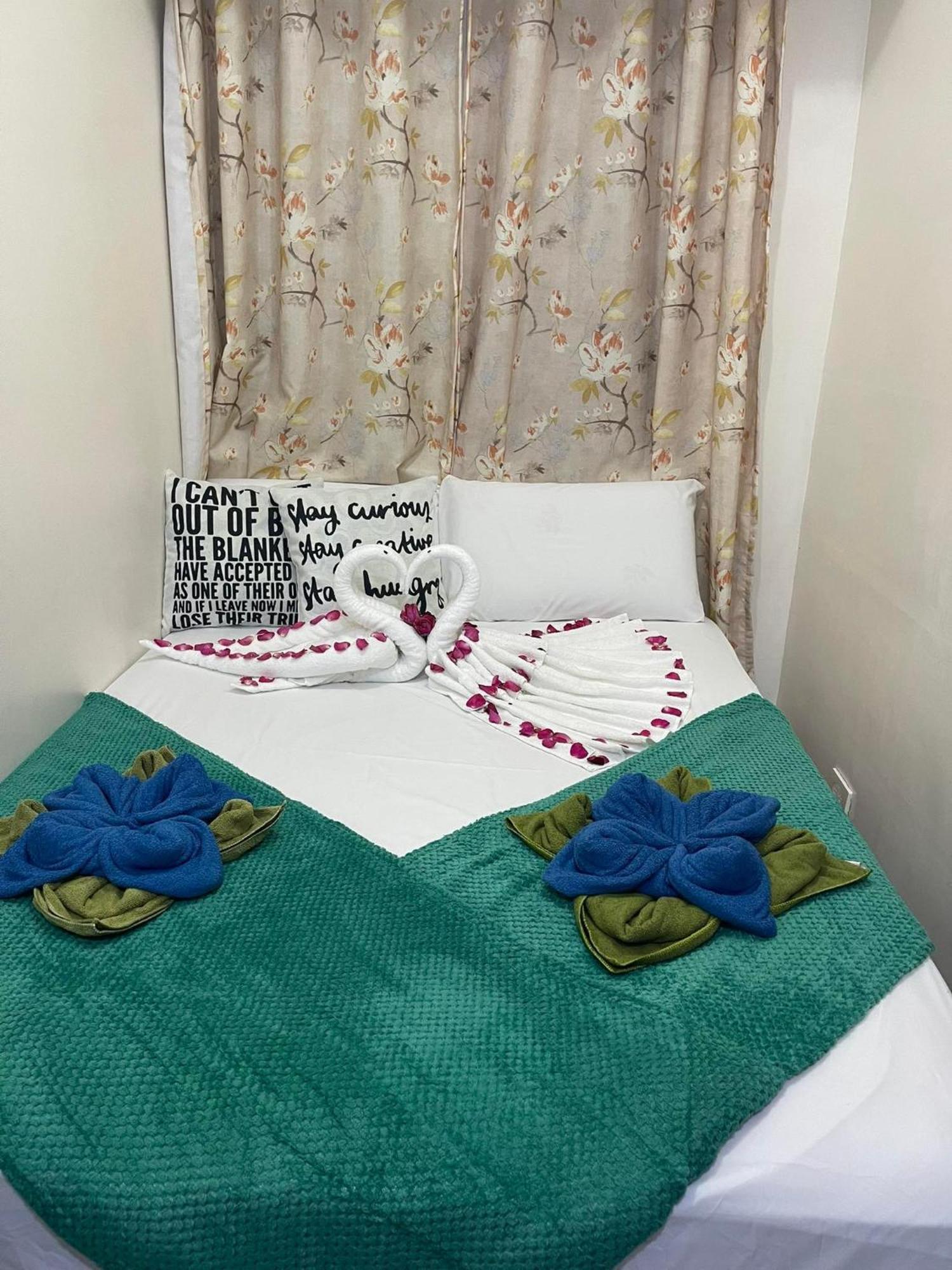 Green Residences Staycation By Pbyy Manila Ruang foto
