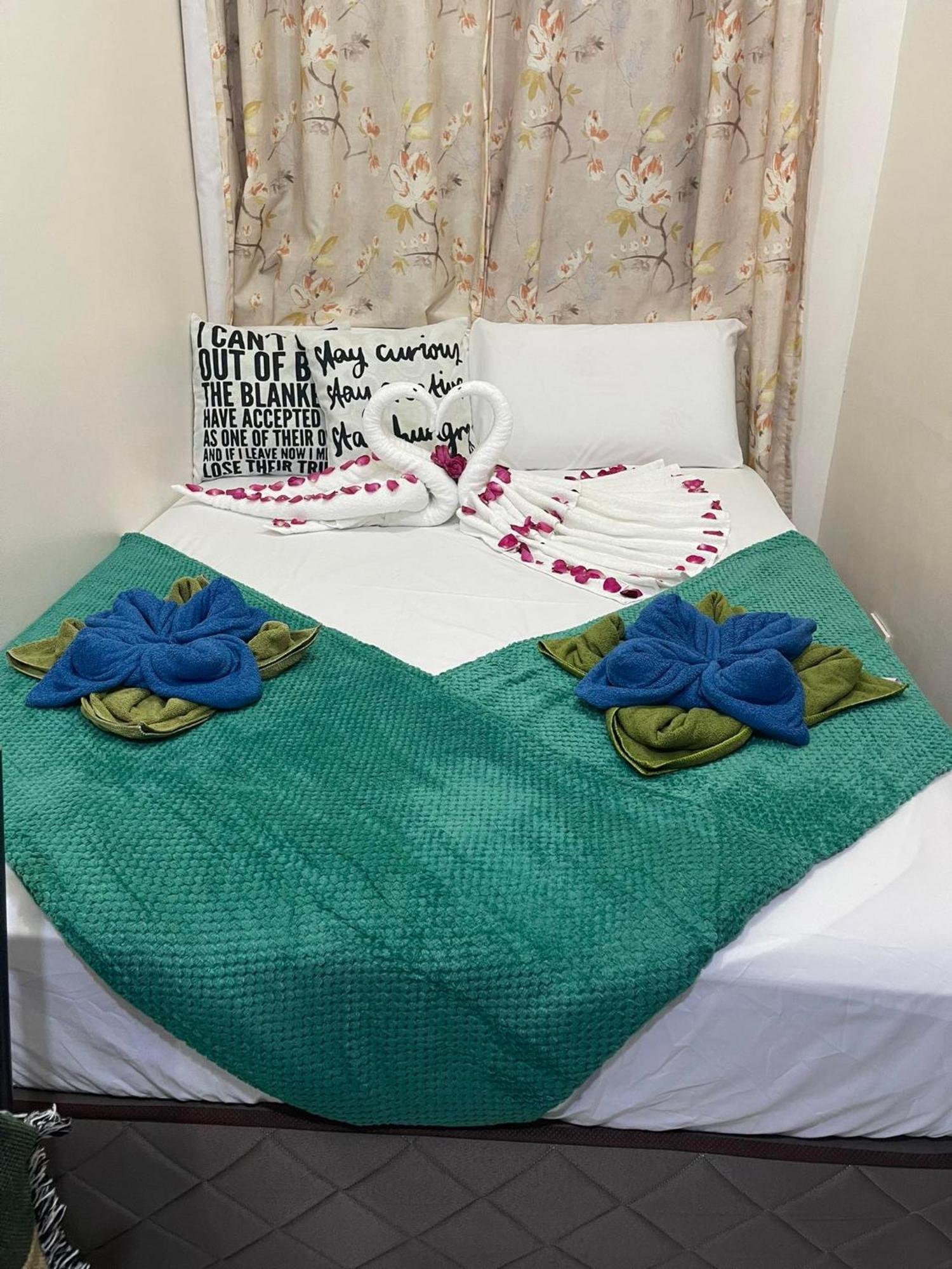 Green Residences Staycation By Pbyy Manila Ruang foto